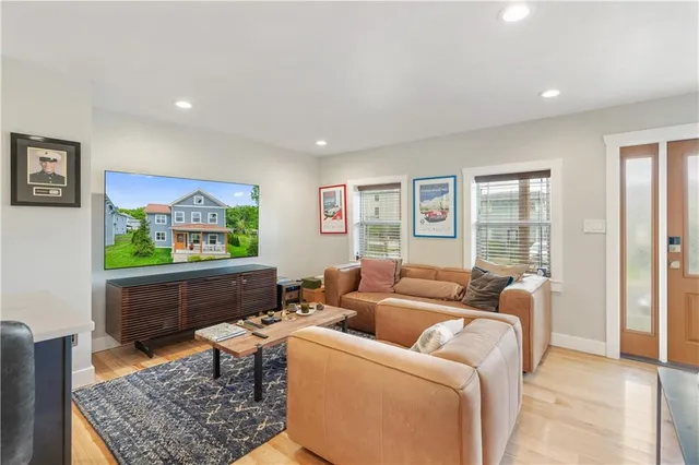 a living room with furniture and a gate