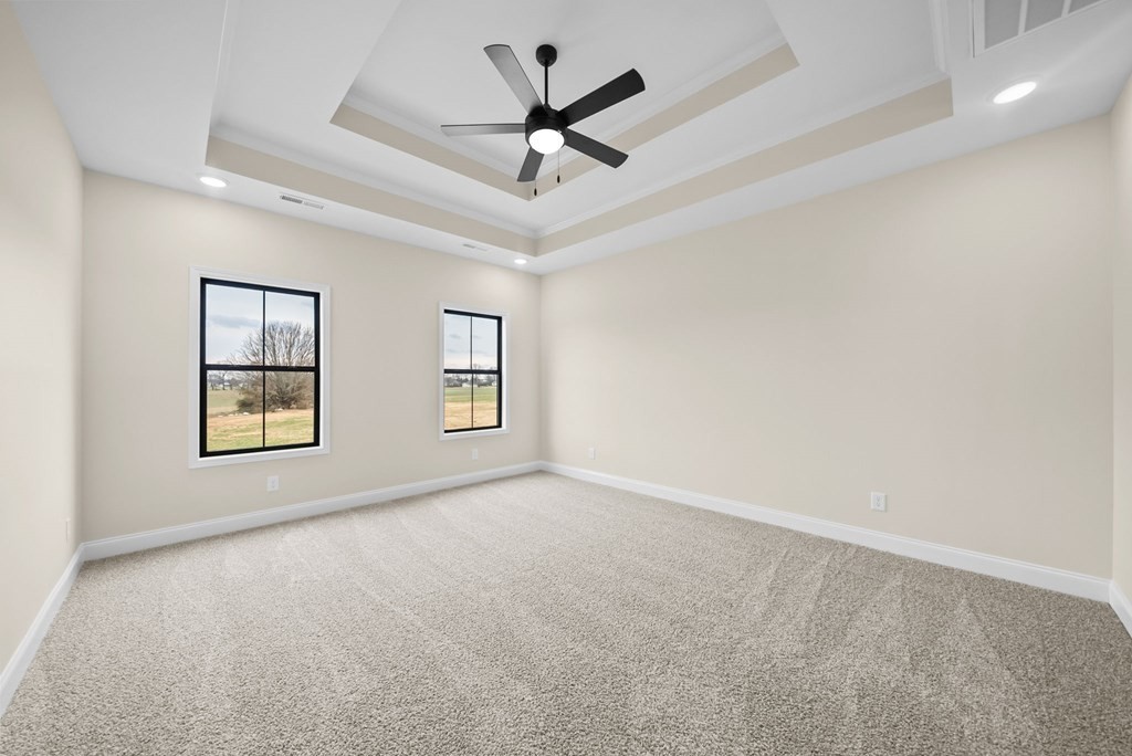 416 Old Major Road Hopkinsville, KY 42240 - Photo 13 of 41 an empty room with windows and ceiling fan