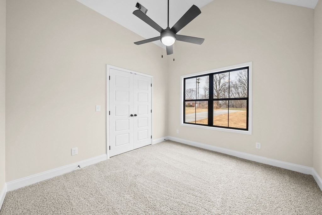 416 Old Major Road Hopkinsville, KY 42240 - Photo 27 of 41 an empty room with a window and a fan