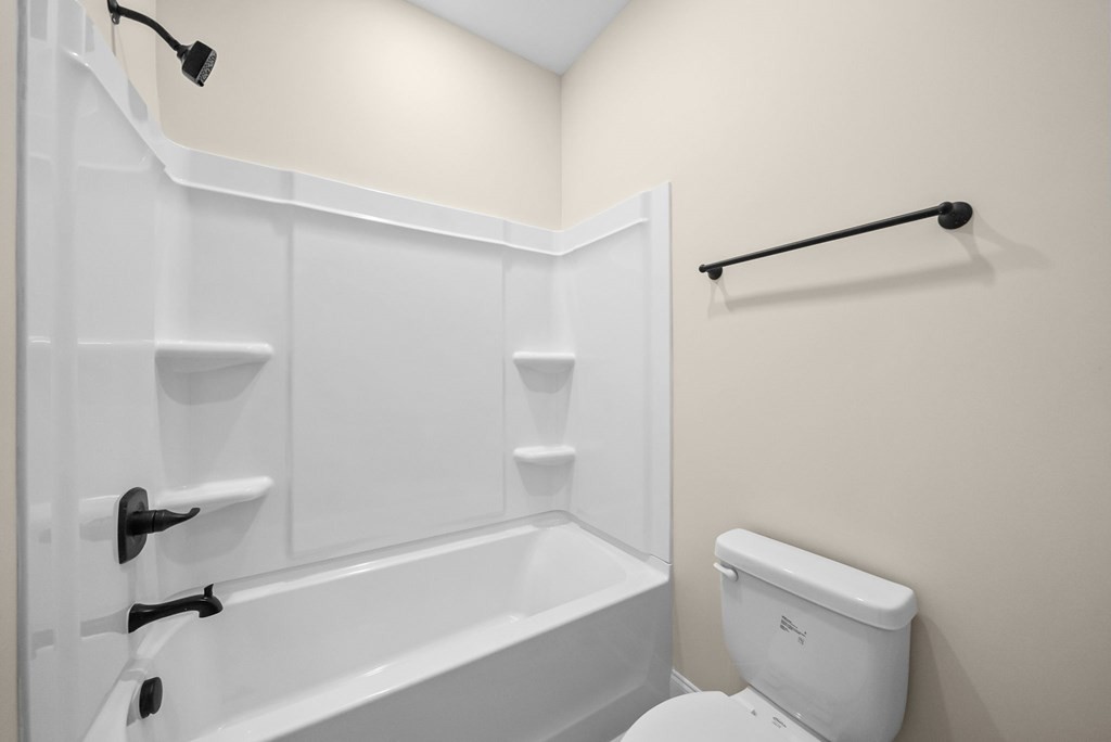 416 Old Major Road Hopkinsville, KY 42240 - Photo 31 of 41 a white toilet sitting next to a bath tub