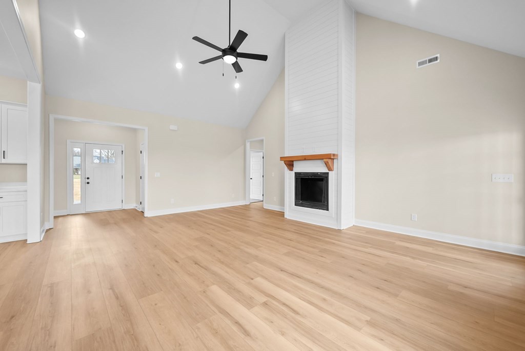 416 Old Major Road Hopkinsville, KY 42240 - Photo 5 of 41 a view of empty room with wooden floor and fan