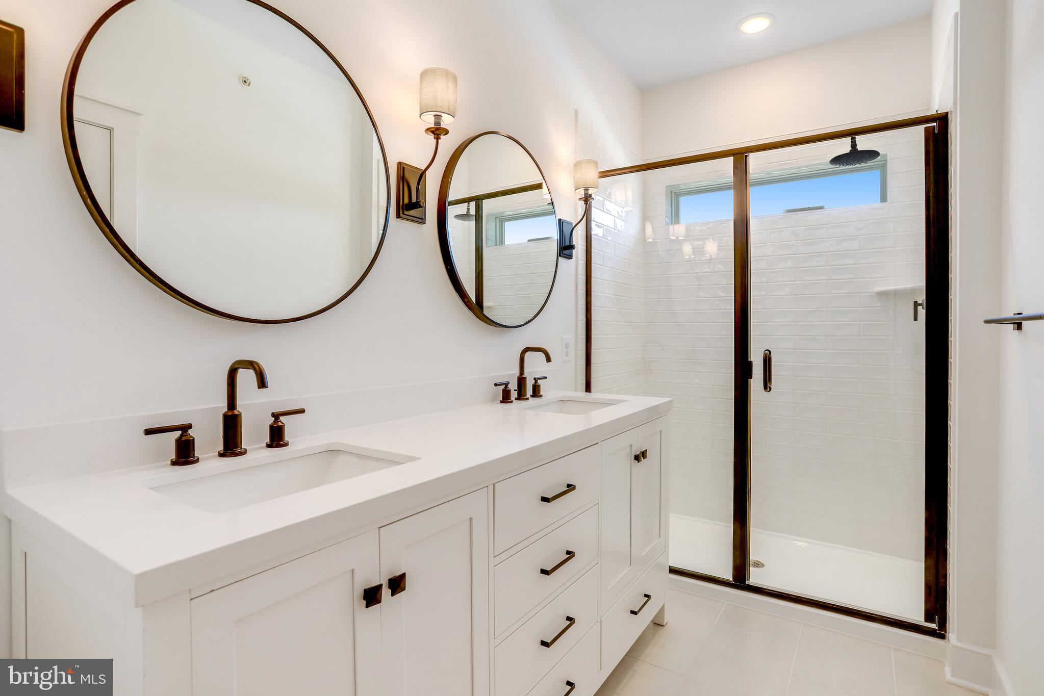 755 Elevation Road Frederick, MD 21702 - Photo 22 of 35 a bathroom with a sink and a mirror