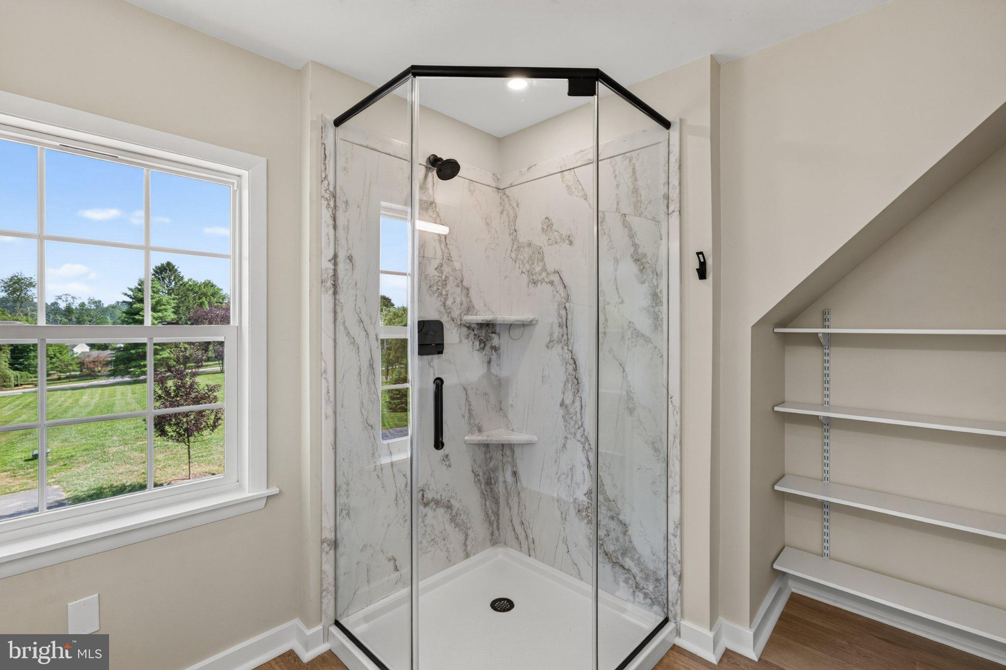 2069 Dutton Mill Road Newtown Square, PA 19073 - Photo 36 of 70 Sleek shower with scenic views.