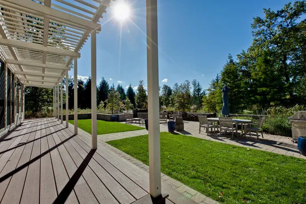 a view of a roof deck with couches