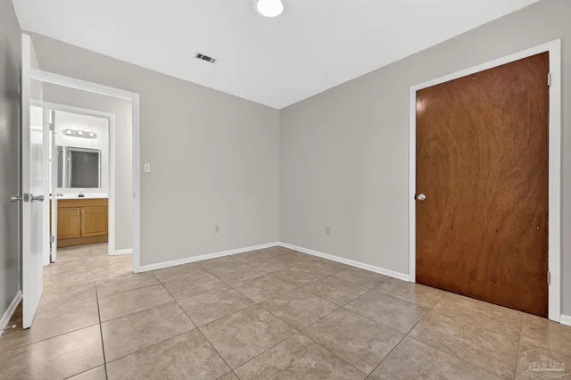 a view of a car park in front of house