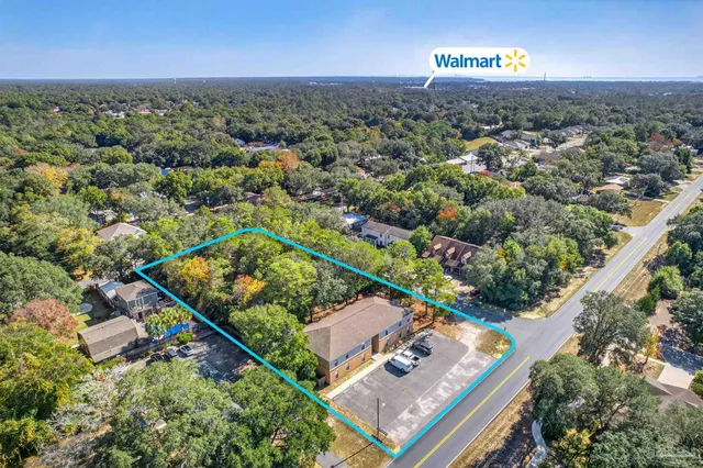 an aerial view of residential house with outdoor space
