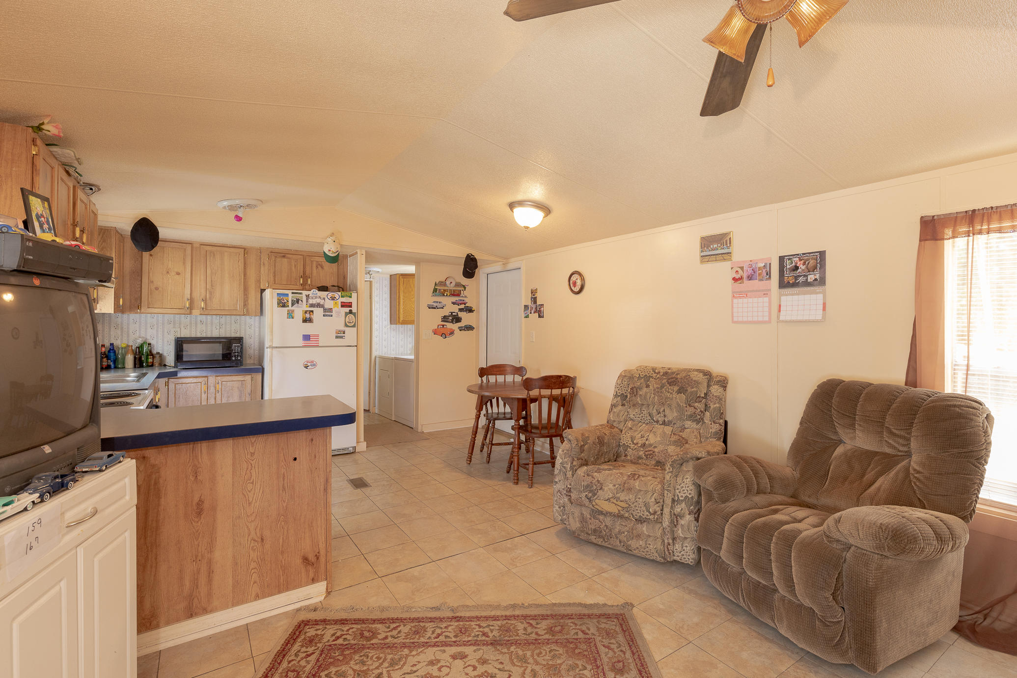 973 Valley Road Crestview, FL 32539 - Photo 2 of 20 a living room with furniture and a flat screen tv