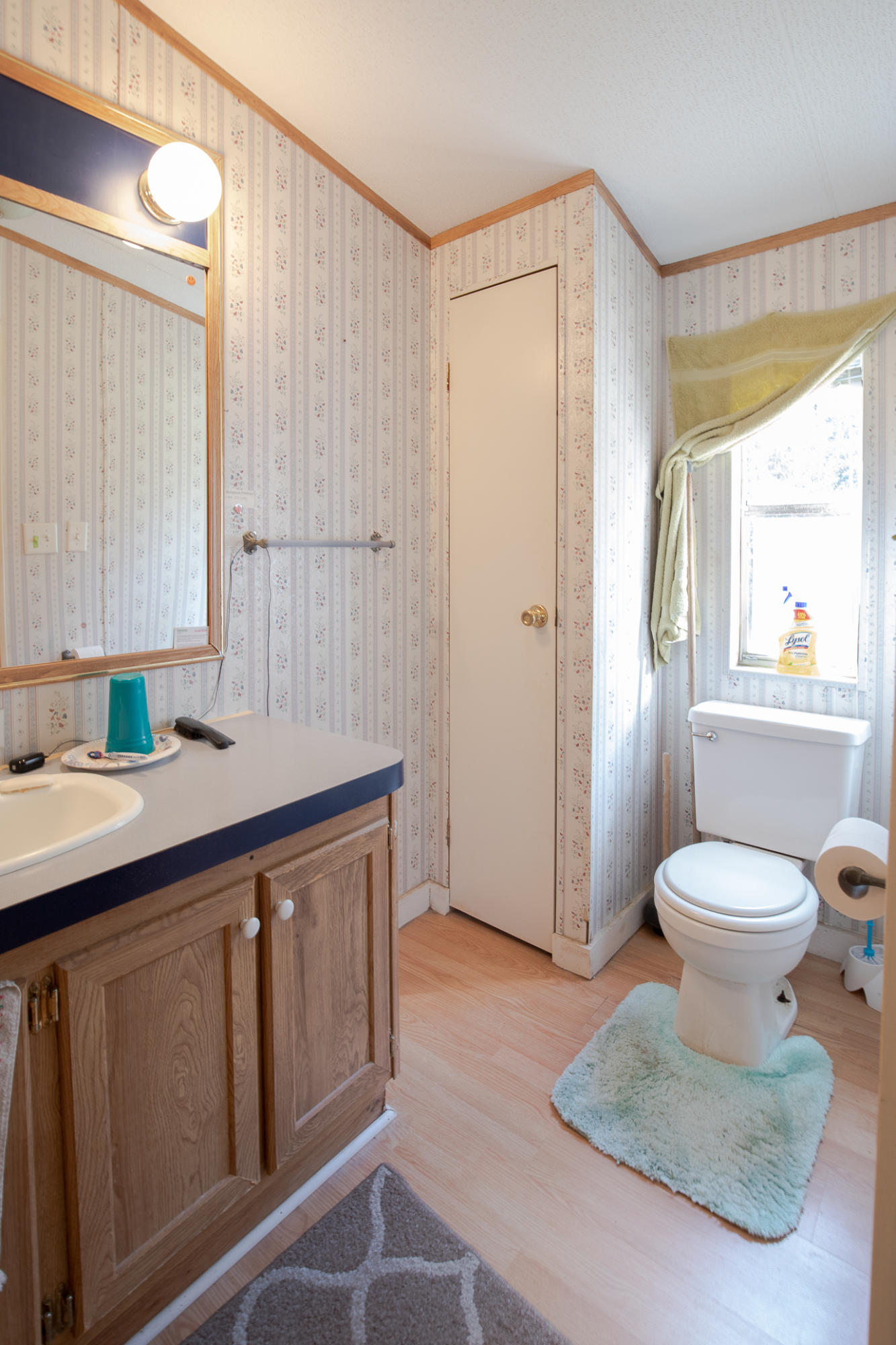 973 Valley Road Crestview, FL 32539 - Photo 9 of 20 a bathroom with a sink a toilet and shower