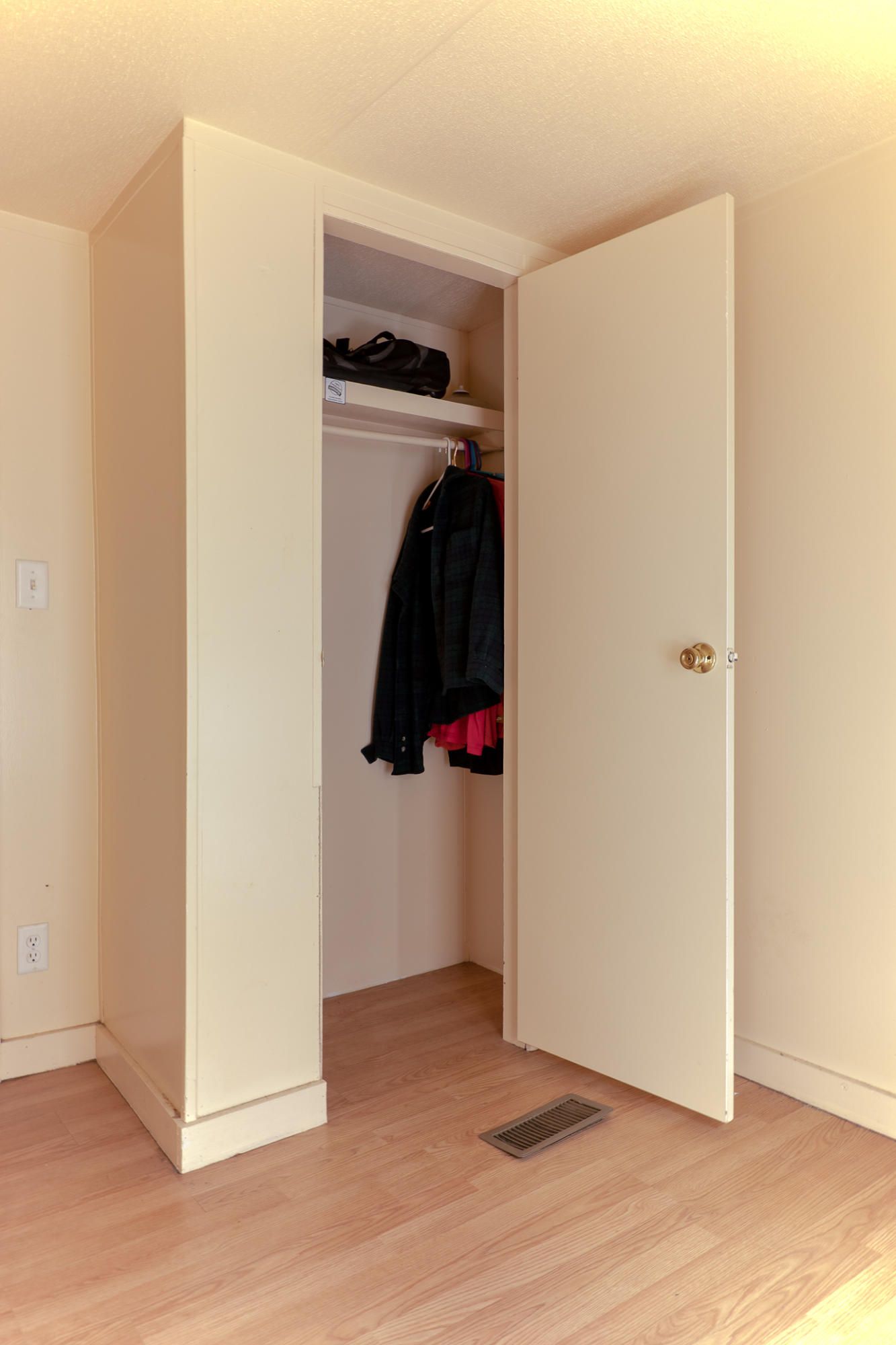973 Valley Road Crestview, FL 32539 - Photo 10 of 20 a view of walk in closet with clothes and shoes