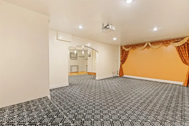 a view of a house with a snow on the road