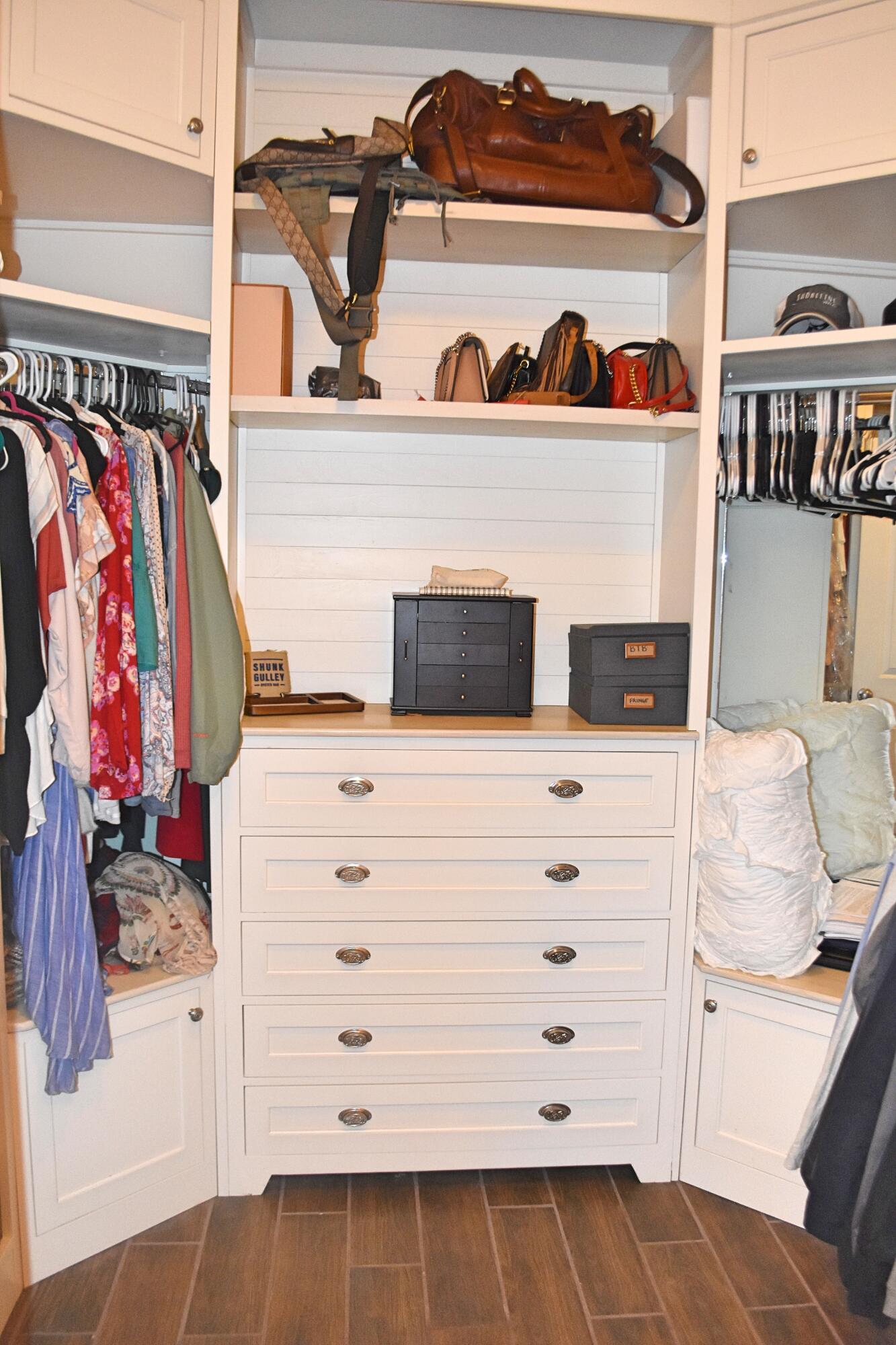 41 Twain Trail Freeport, FL 32439 - Photo 20 of 24 a view of walk in closet with clothes and shoes