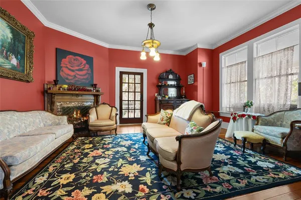 a bathroom with a sink a mirror a toilet and a shower