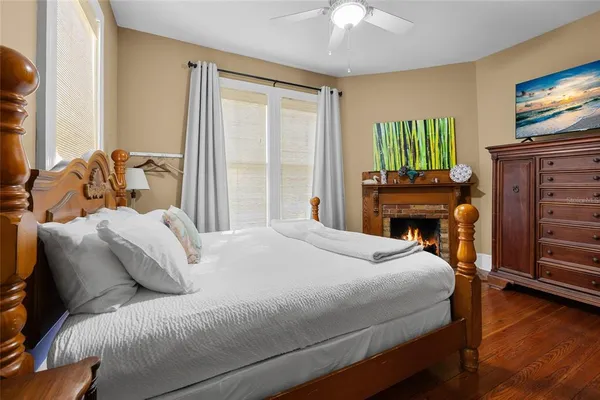 a bed room with a bed and a night stand