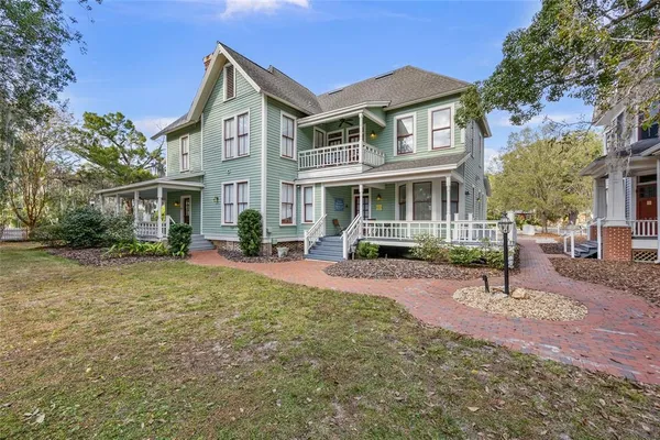 a front view of a building with sitting area