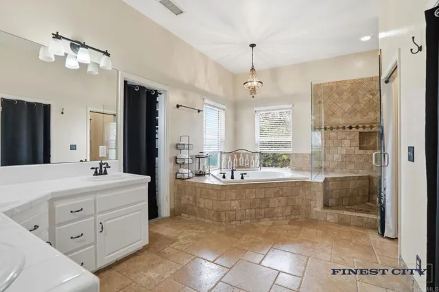 an aerial view of a house with a garden