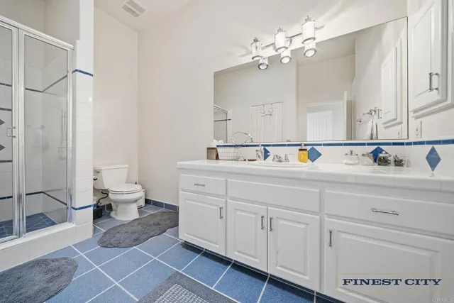 a view of a green field with lots of trees