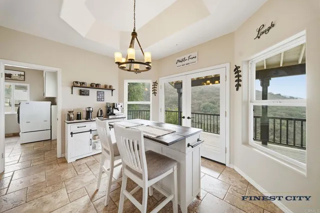 a bathroom with a tub sink and window