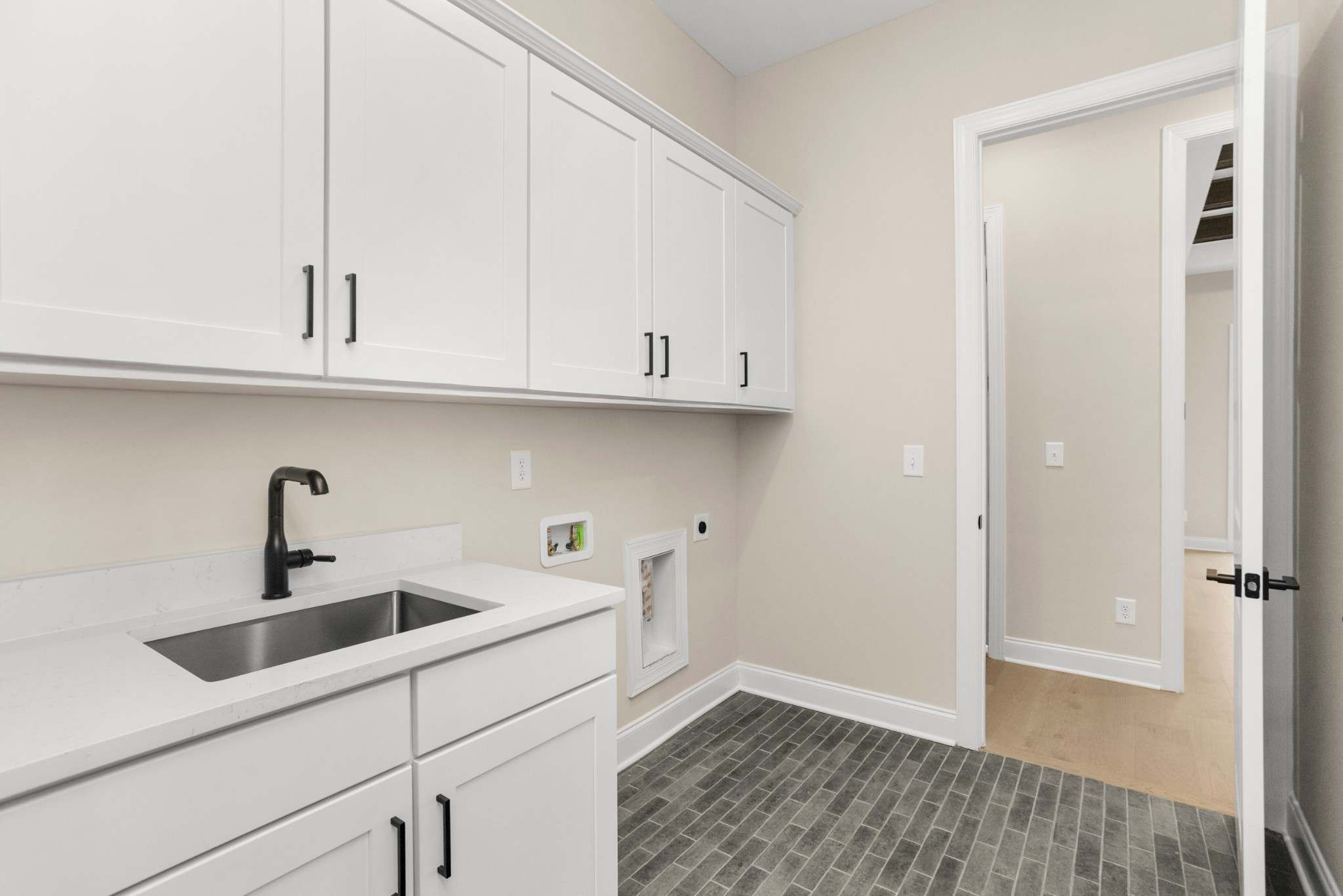 1939 Harmony Road Spring Hill, TN 37174 - Photo 18 of 50 a kitchen with stainless steel appliances granite countertop white cabinets and a sink