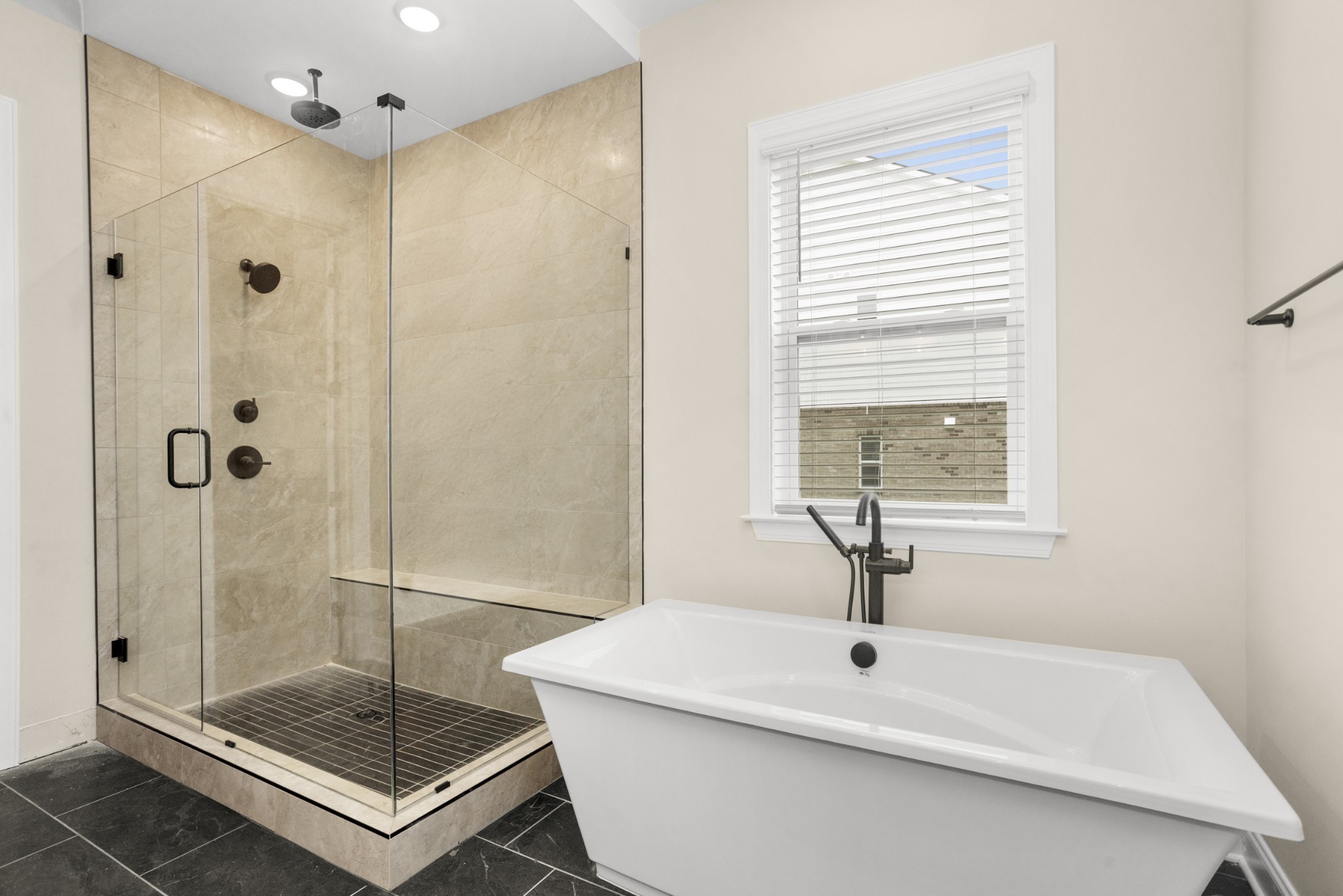 1939 Harmony Road Spring Hill, TN 37174 - Photo 23 of 50 a bathroom with a shower and a sink