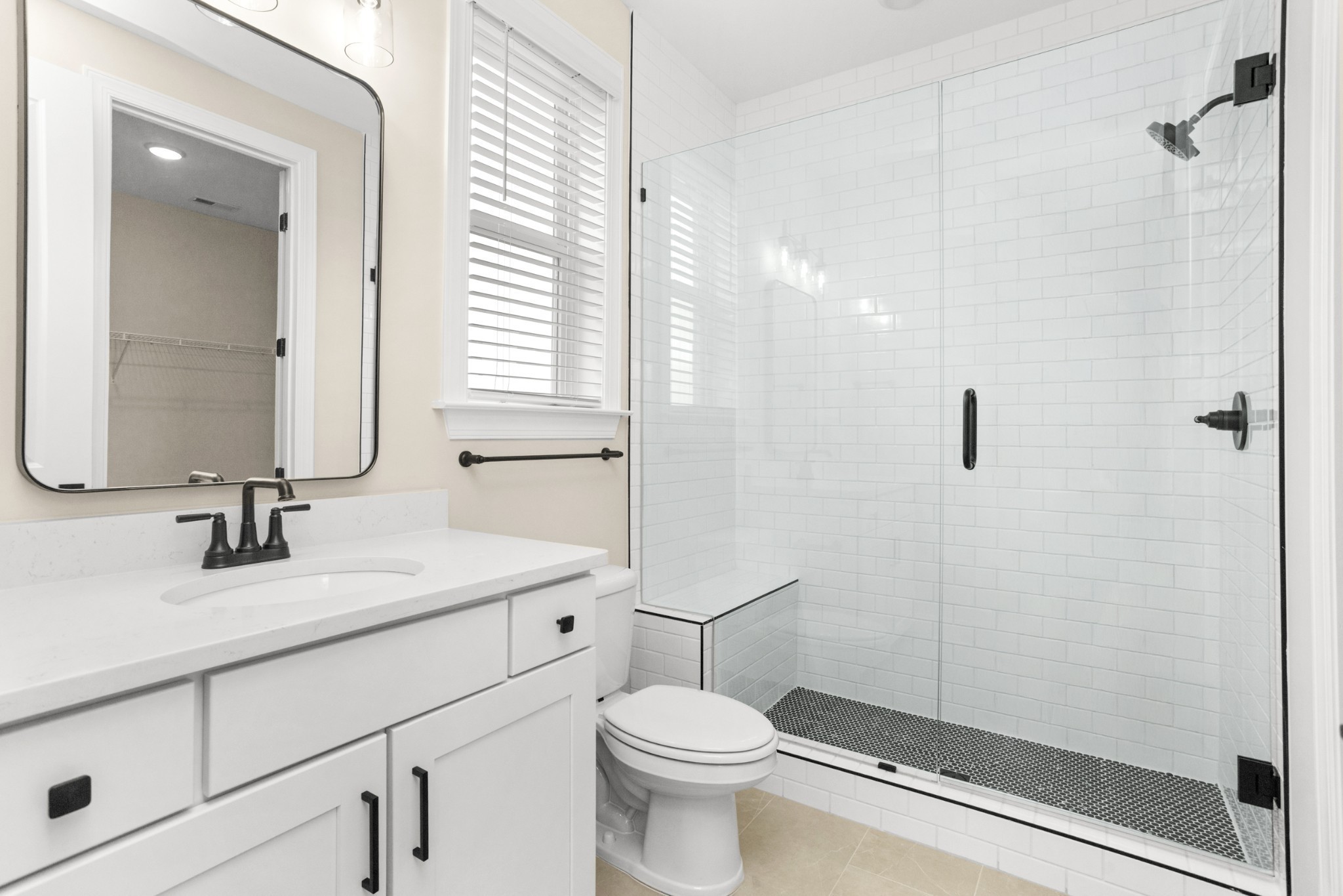 1939 Harmony Road Spring Hill, TN 37174 - Photo 32 of 50 a bathroom with a sink a toilet and shower