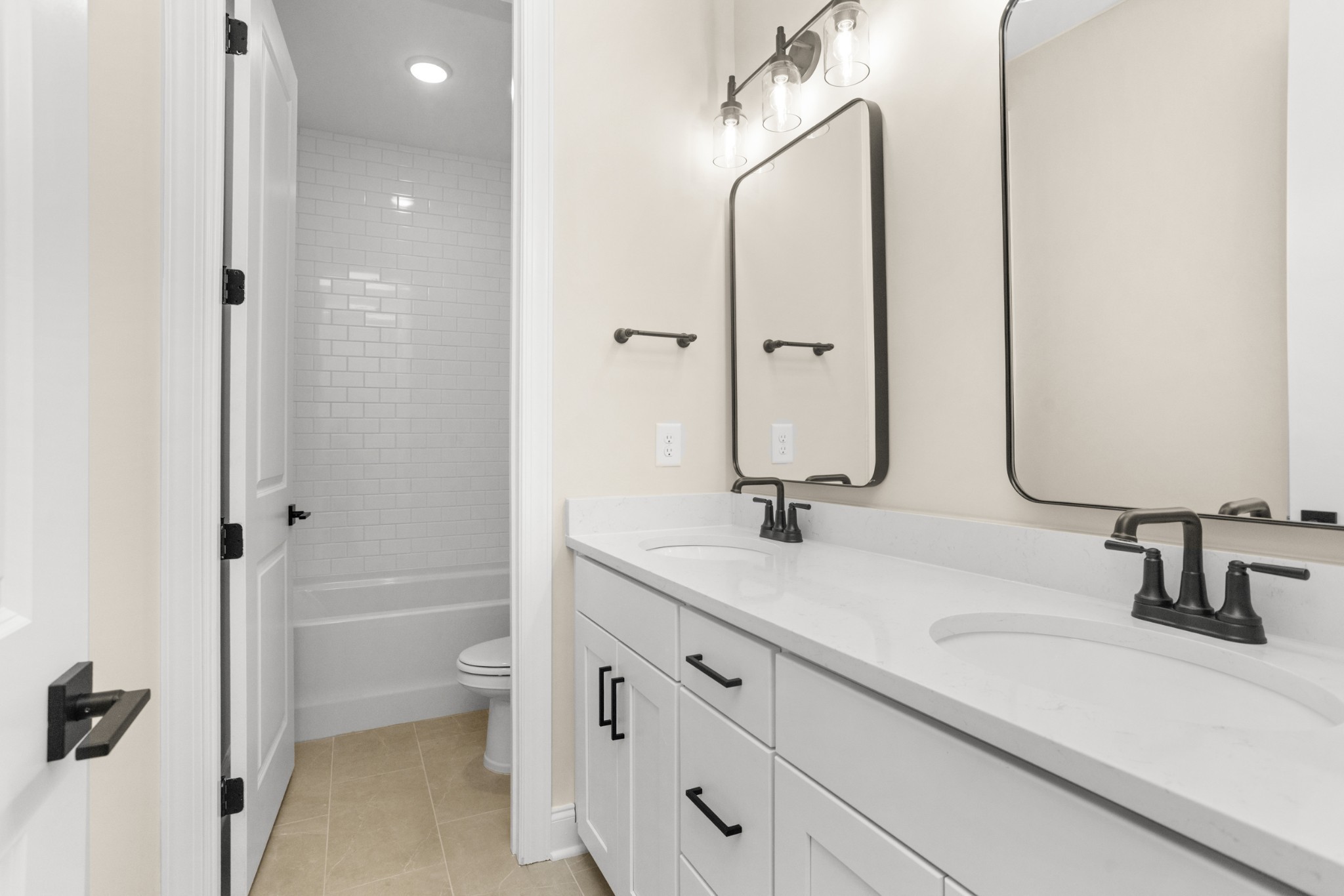 1939 Harmony Road Spring Hill, TN 37174 - Photo 35 of 50 a bathroom with a sink double vanity and a mirror