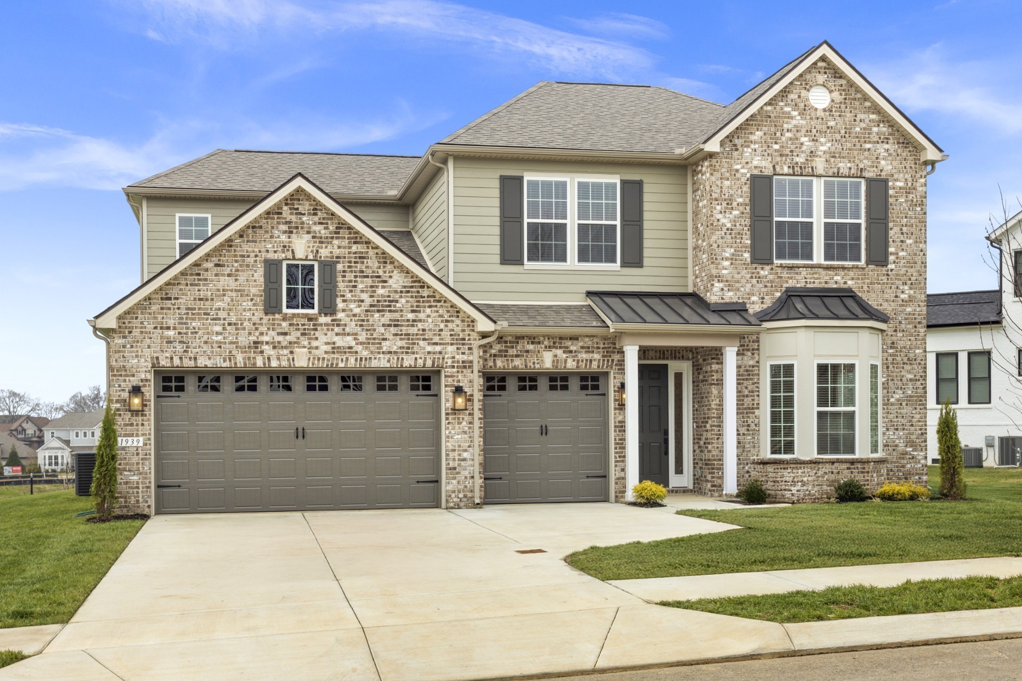 1939 Harmony Road Spring Hill, TN 37174 - Photo 39 of 50 a front view of a house with a yard