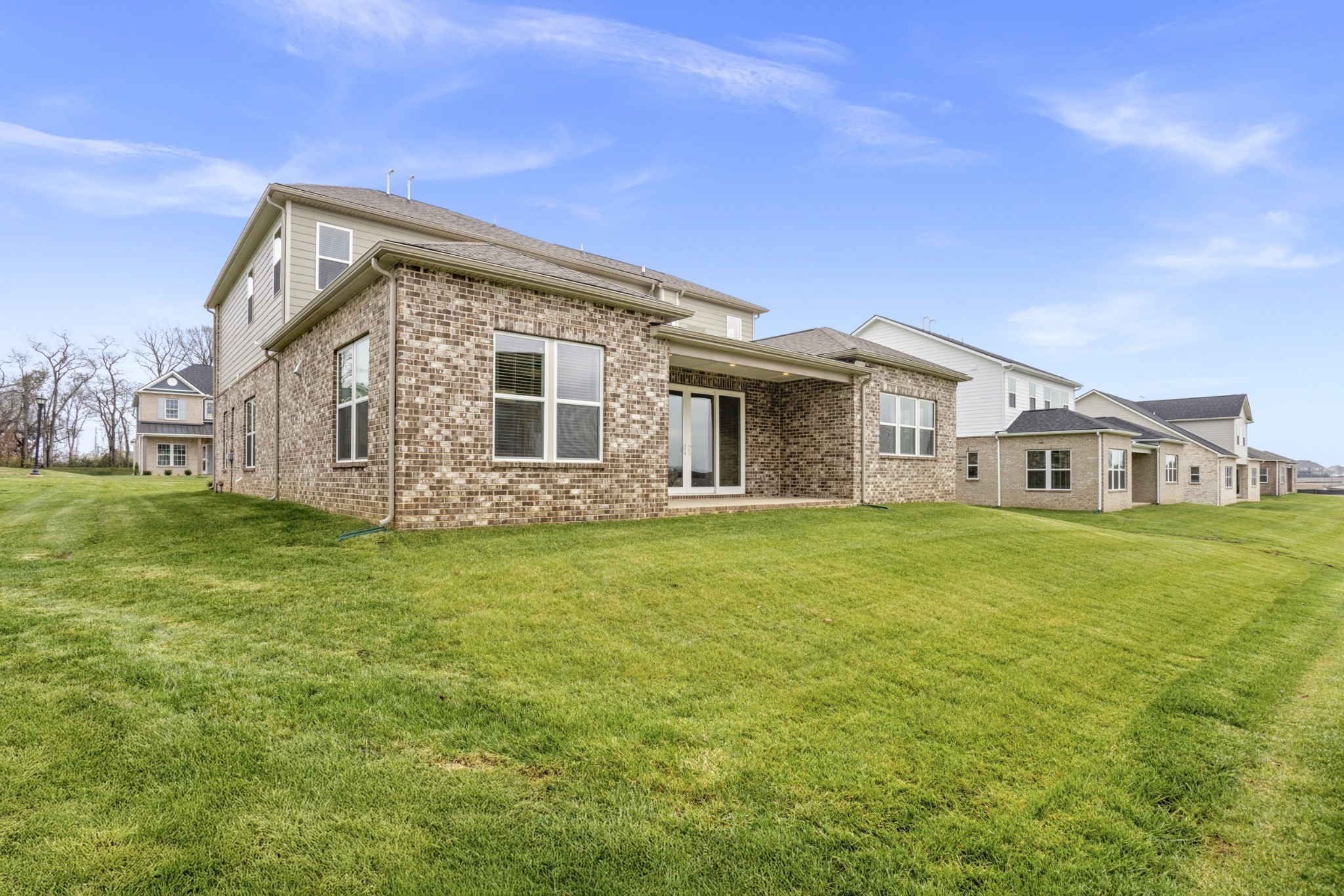 1939 Harmony Road Spring Hill, TN 37174 - Photo 40 of 50 a front view of a house with a garden