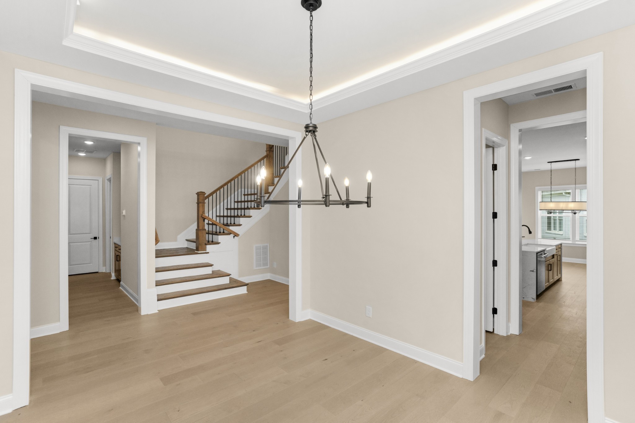 1939 Harmony Road Spring Hill, TN 37174 - Photo 6 of 50 a view of a hallway with wooden floor and staircase