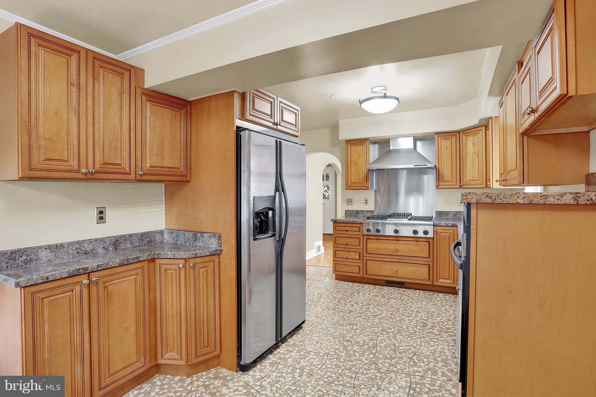 9408 Flower Avenue Silver Spring, MD 20901 - Photo 11 of 29 Stainless steel appliances and ceramic tile floor