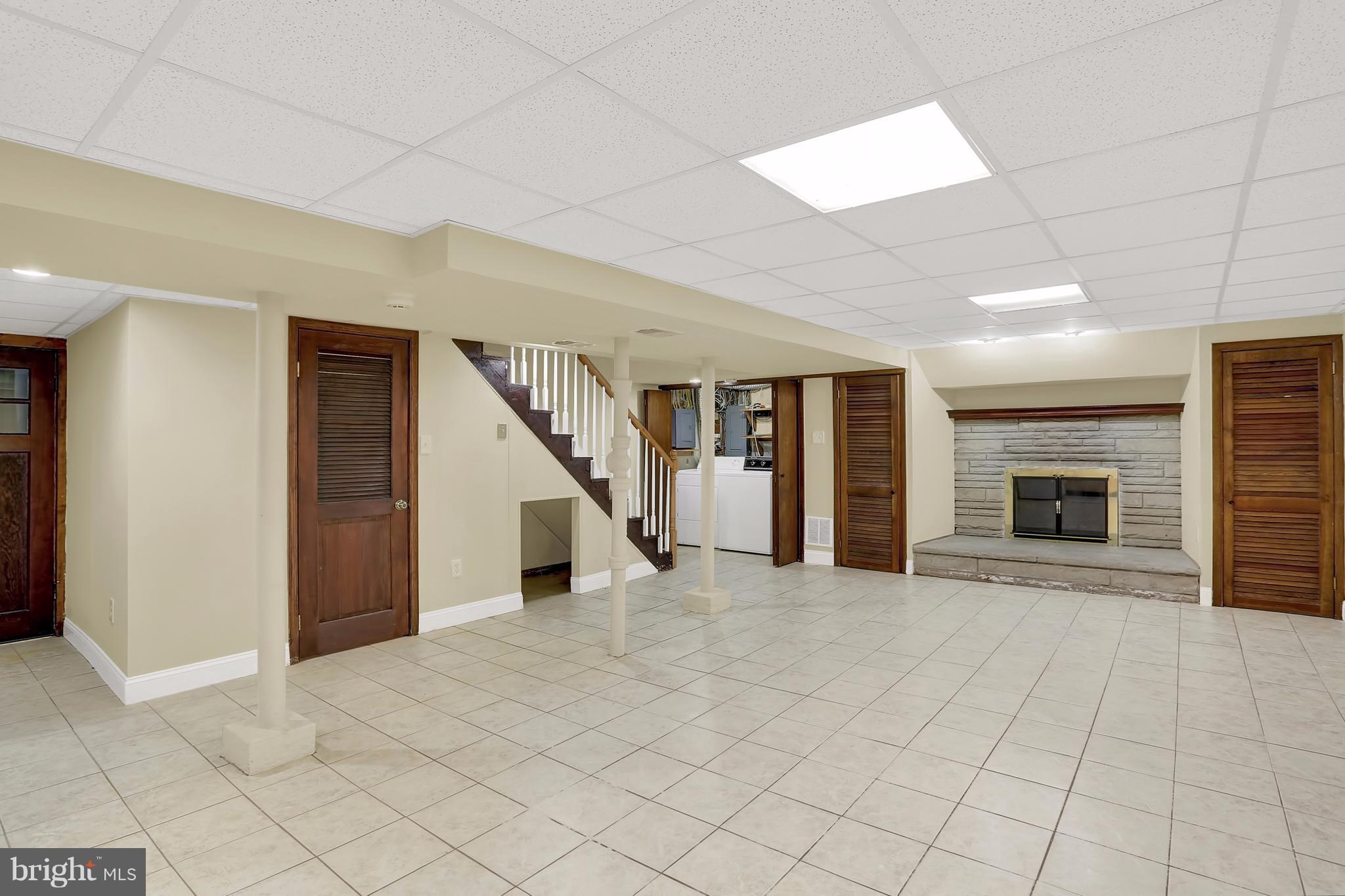9408 Flower Avenue Silver Spring, MD 20901 - Photo 5 of 29 Spacious finished basement rec room with FP