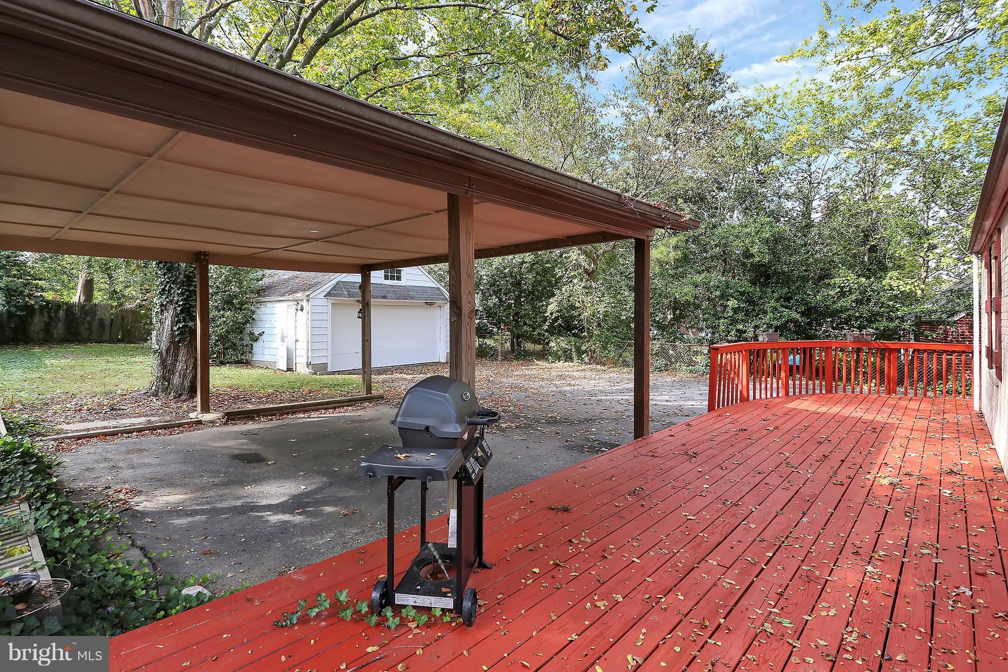 9408 Flower Avenue Silver Spring, MD 20901 - Photo 6 of 29 Large rear deck, covered carport, and 2 car garage
