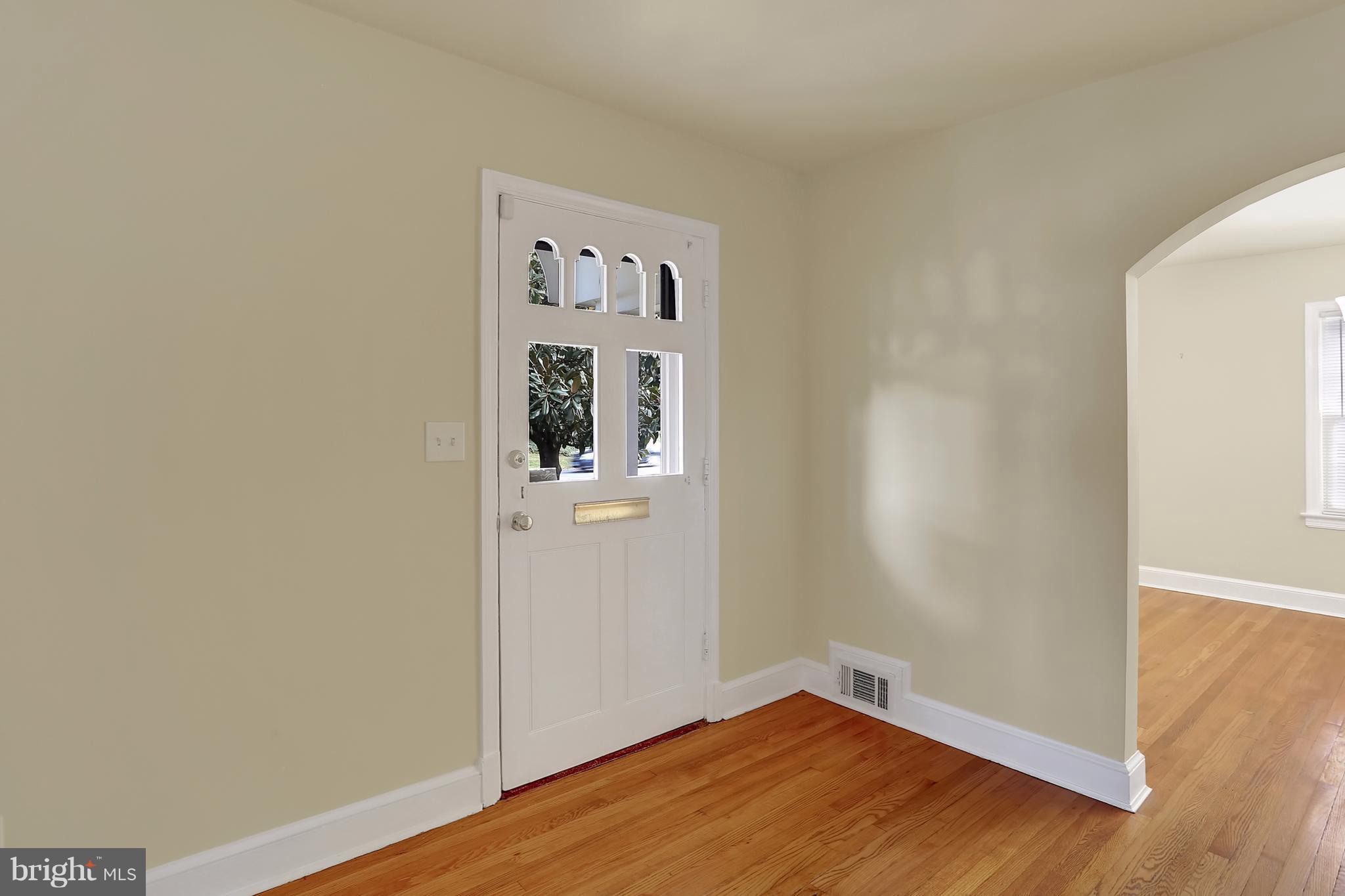 9408 Flower Avenue Silver Spring, MD 20901 - Photo 7 of 29 Front door and foyer area