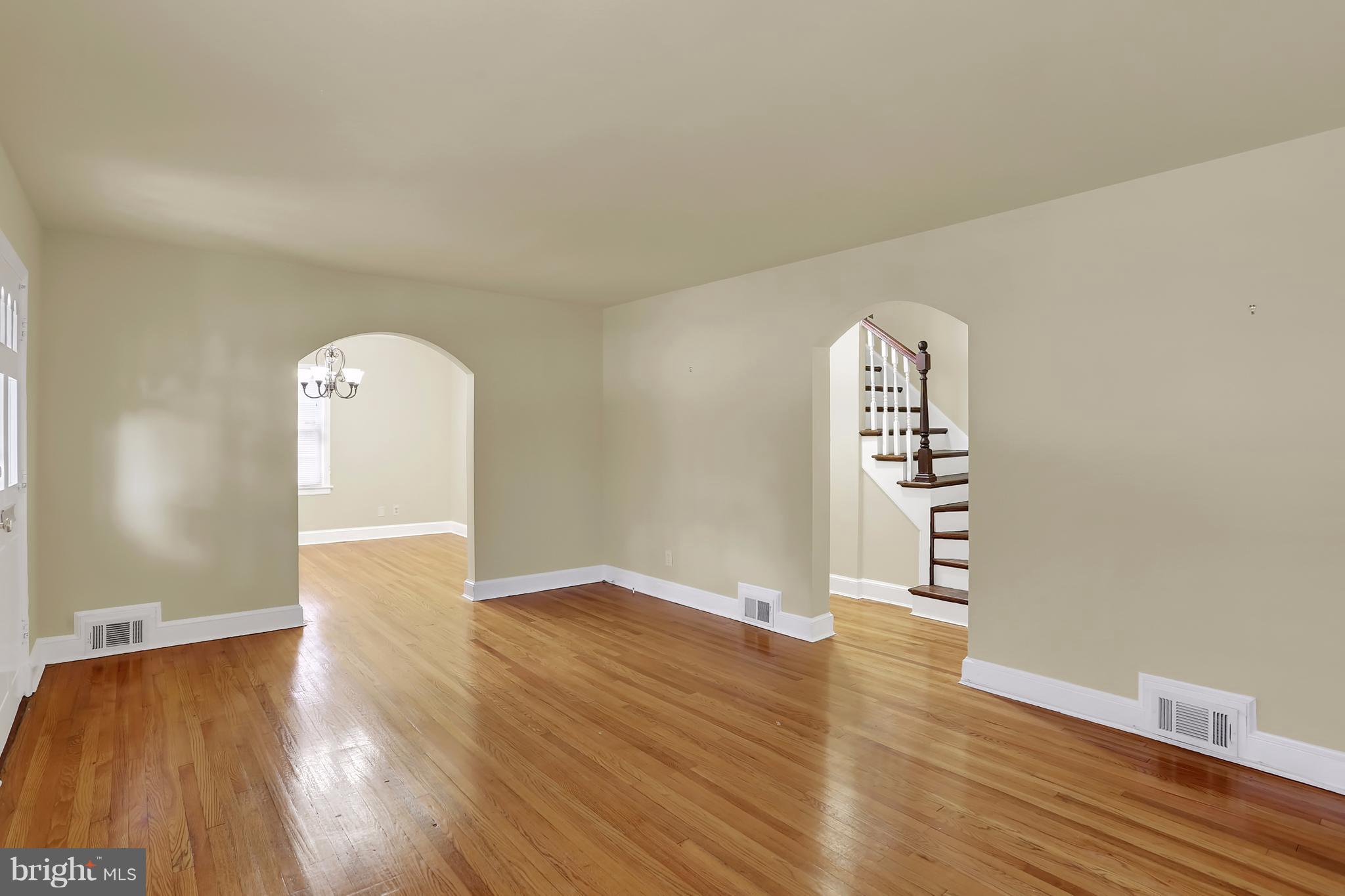 9408 Flower Avenue Silver Spring, MD 20901 - Photo 8 of 29 Living Room looking to foyer and dining room