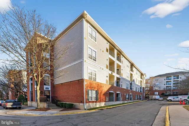 a view of a building with a street