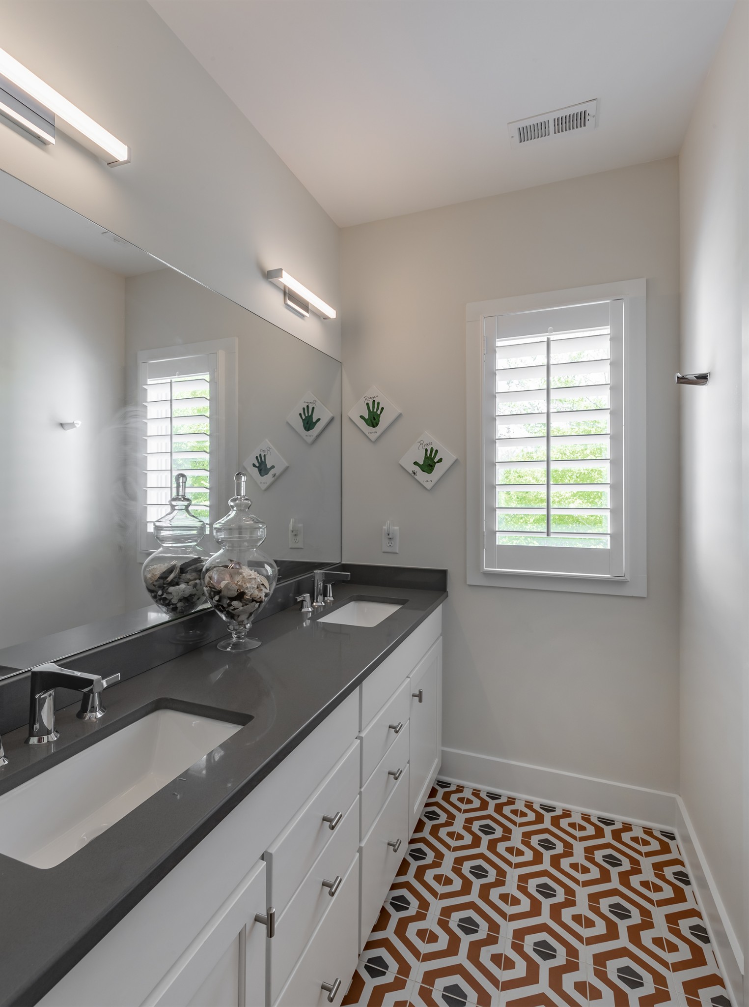 5304 Old Harding Road Franklin, TN 37064 - Photo 13 of 29 a bathroom with double sink and a mirror