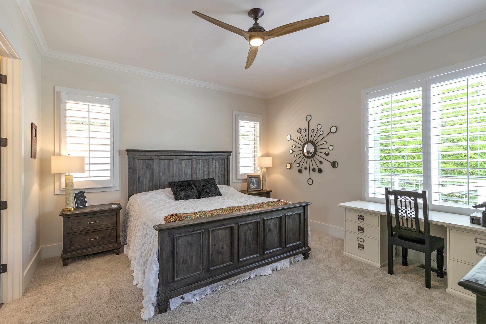 5304 Old Harding Road Franklin, TN 37064 - Photo 20 of 29 a bedroom with a large bed and a chandelier