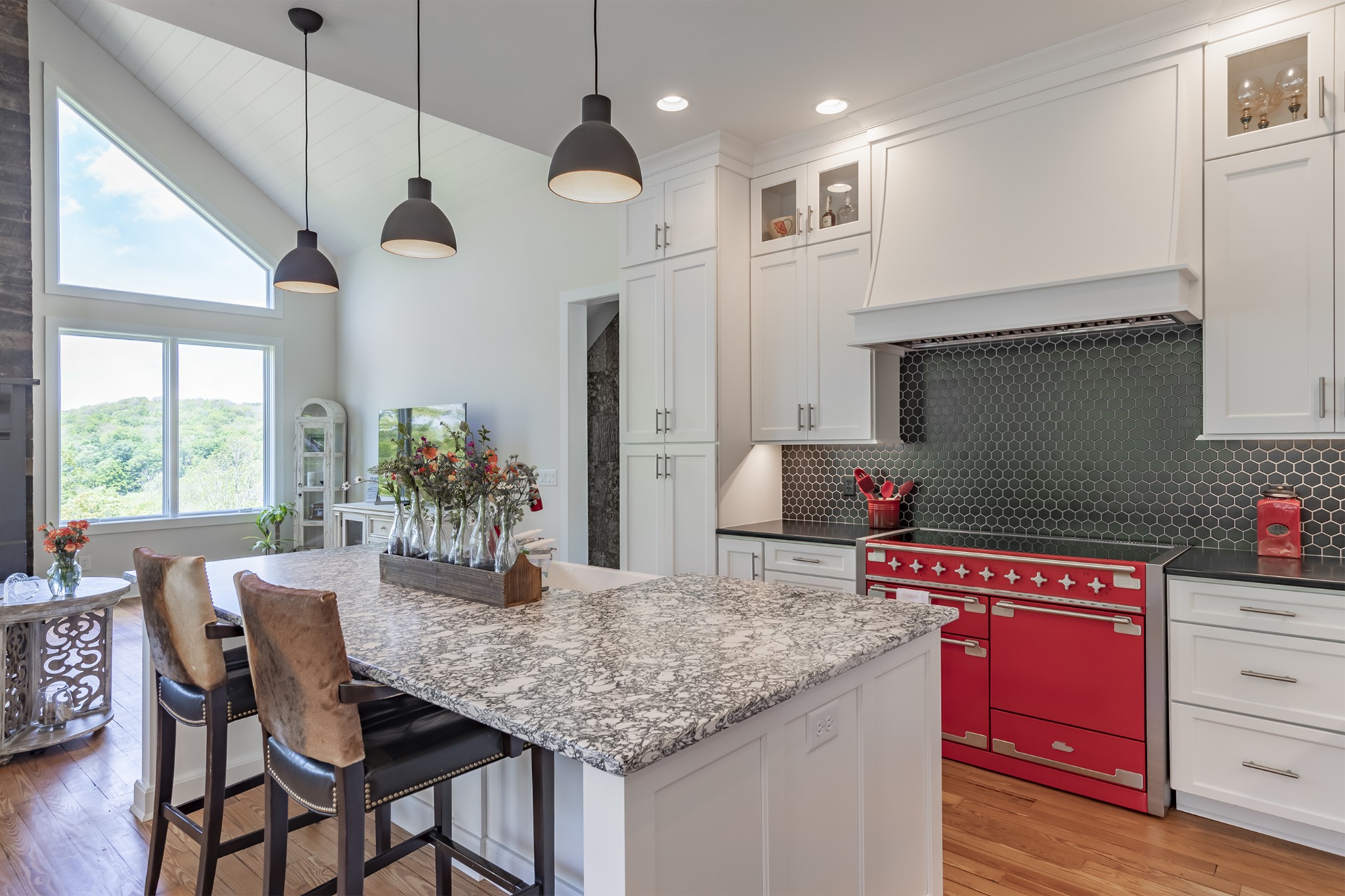 5304 Old Harding Road Franklin, TN 37064 - Photo 8 of 29 a kitchen with stainless steel appliances granite countertop a kitchen island a stove and a cabinets