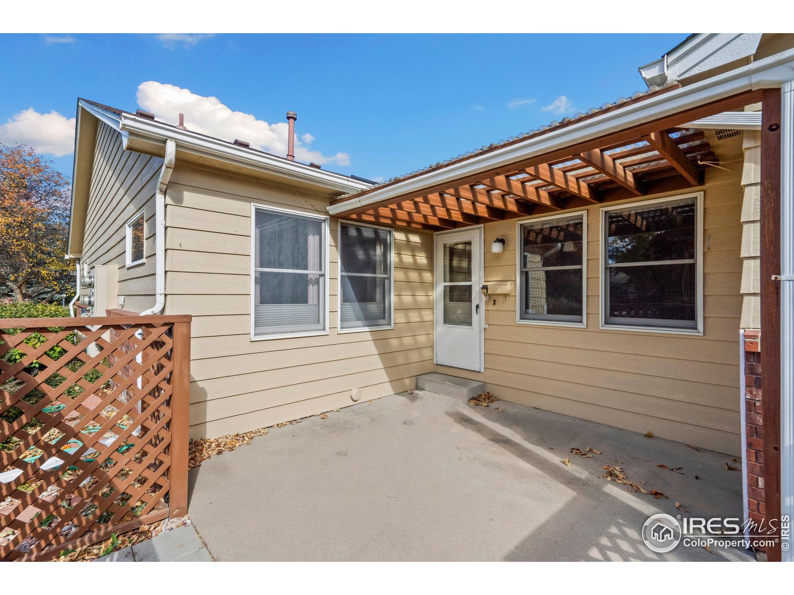 3344 Hickok Drive, Unit F Fort Collins, CO 80526 - Photo 23 of 24 a view of front door