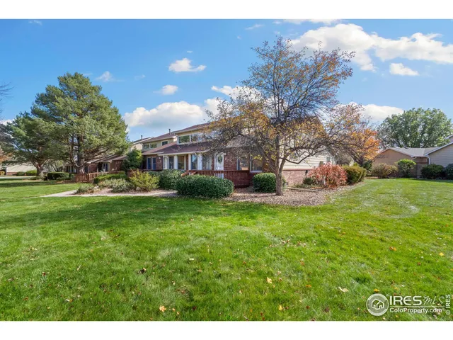a view of a house with a big yard