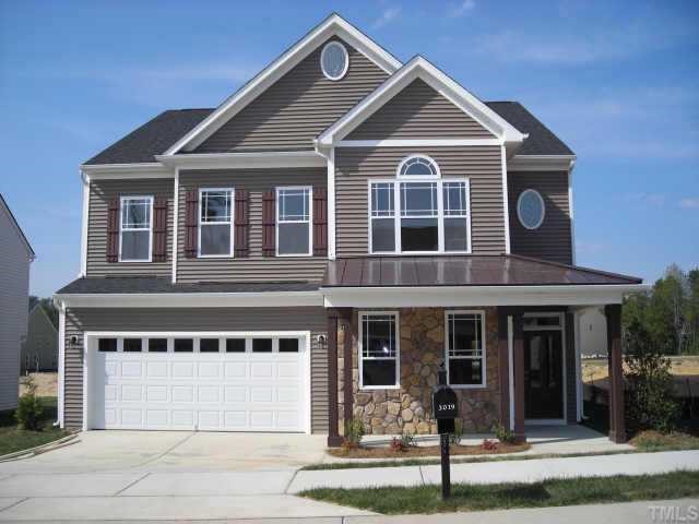3019 Landing Falls Lane Raleigh, NC 27616 - Photo 1 of 3 a front view of a house with a yard
