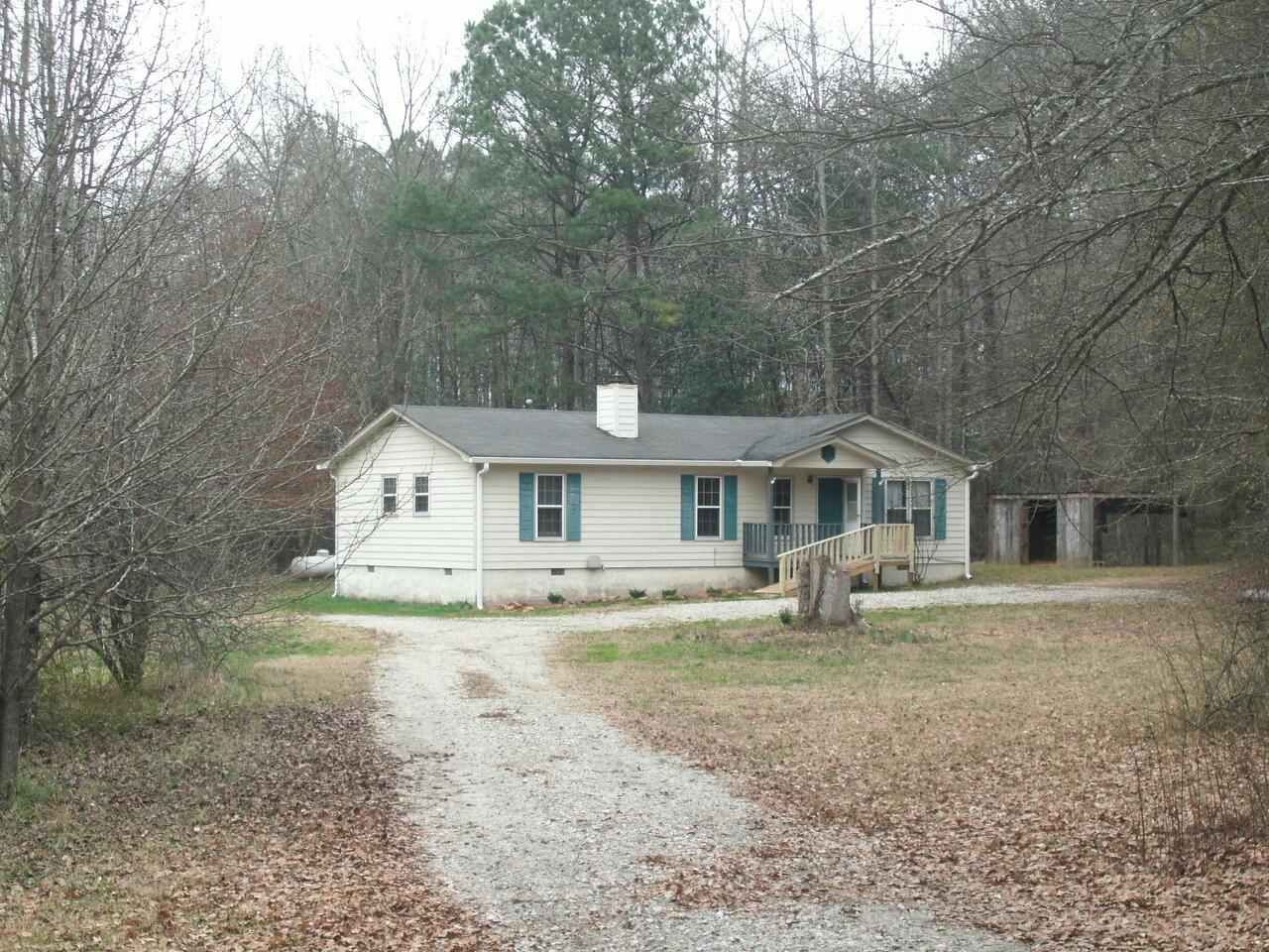 820 Joe Stephens Road Franklin, GA 30217 - Photo 1 of 1 a house that has a tree in front of it