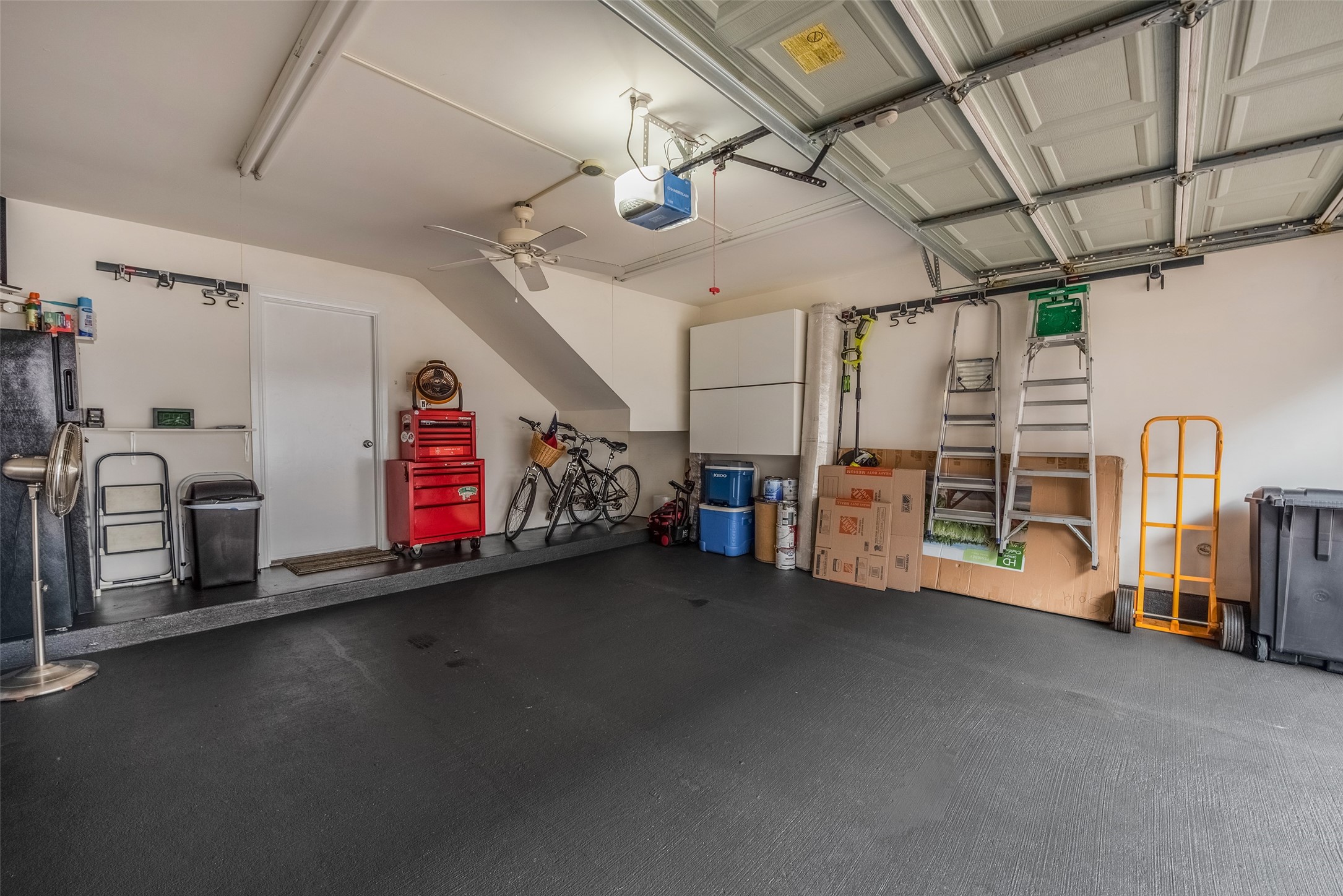 1028 La Rue Street Houston, TX 77019 - Photo 23 of 29 Painted floor and storage