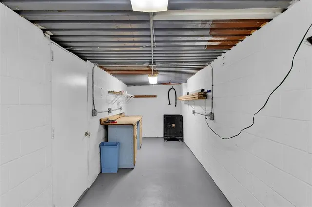 a kitchen with a refrigerator and a sink