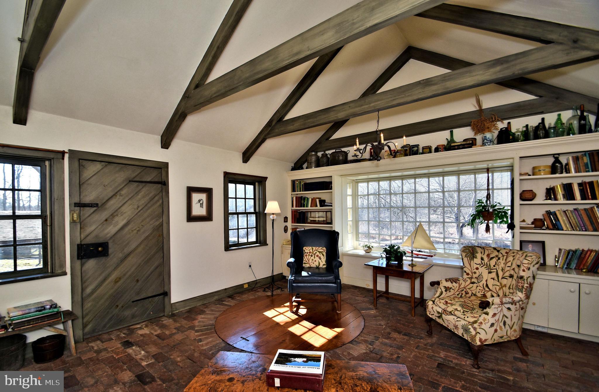 554 Mud Road Newtown, PA 18940 - Photo 14 of 46 Sun Room with brick floor. Cistern preserved.