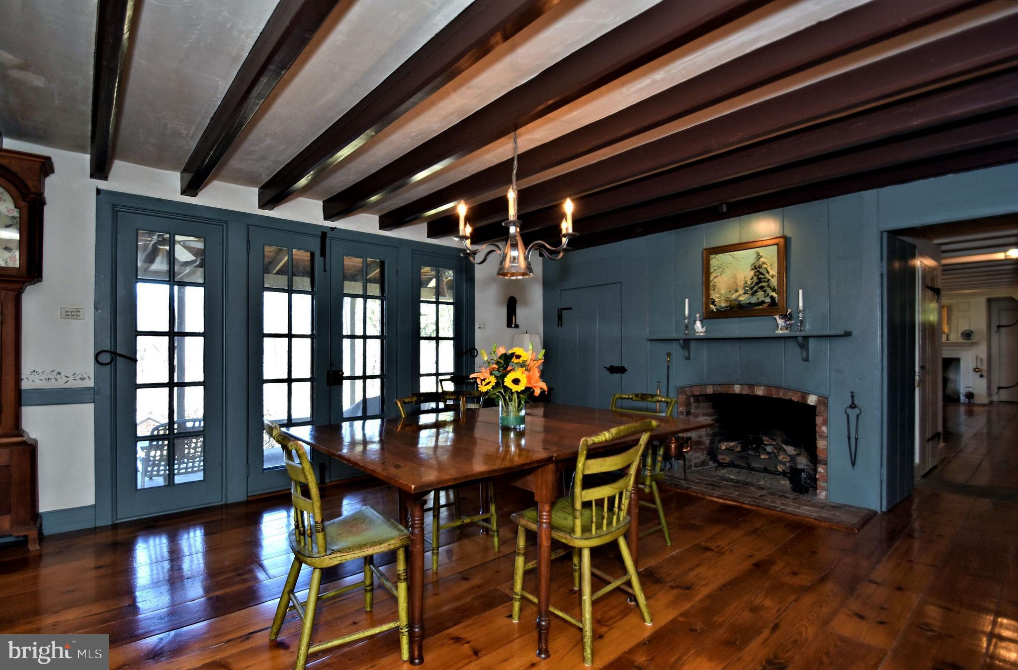 554 Mud Road Newtown, PA 18940 - Photo 7 of 46 Dining Room with Fireplace, French Doors to porch.