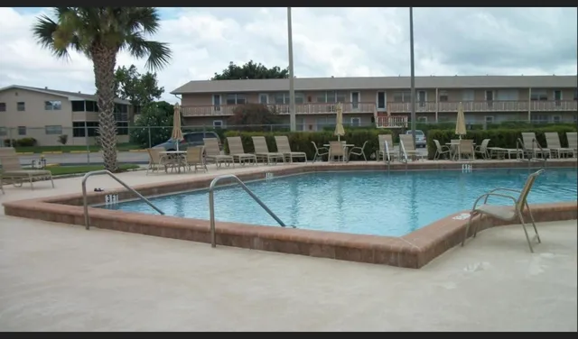 a view of a garden from a balcony