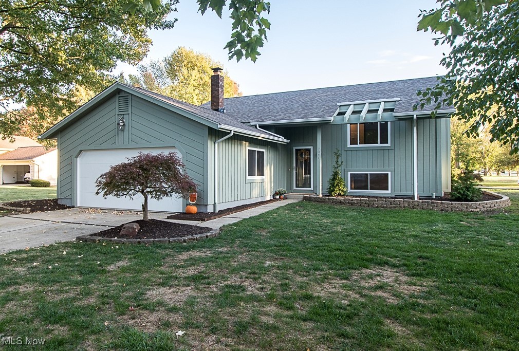 7041 Hopkins Road Mentor, OH 44060 - Photo 45 of 46 Don't let the busy street address fool you, this home enjoys a peaceful twist, with the front door & driveway facing a serene cul-de-sac, making for easy and stress-free comings & goings!