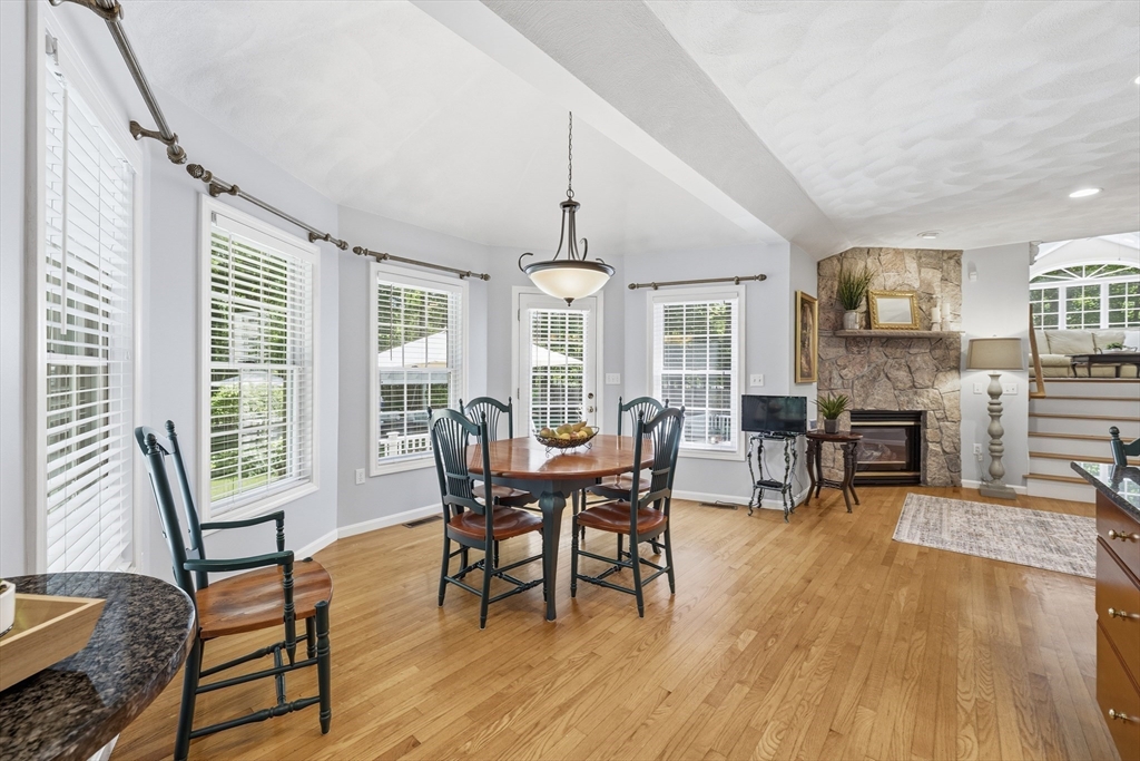 25 Haymeadow Road Boxford, MA 01921 - Photo 16 of 42 a view of a dining room with furniture window and wooden floor