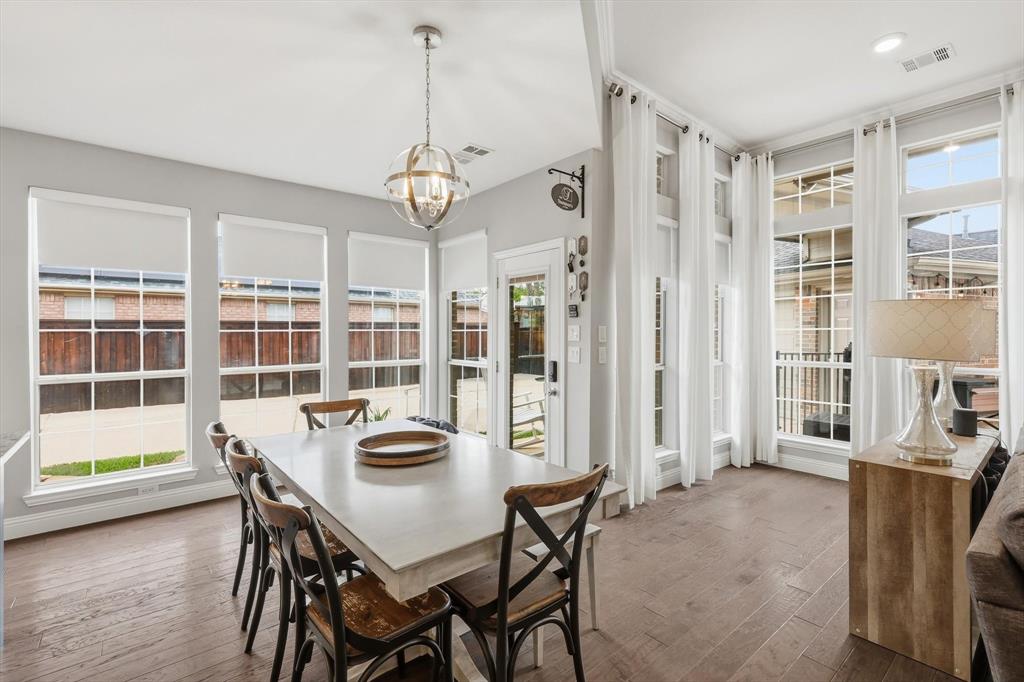 216 Durango Drive Trophy Club, TX 76262 - Photo 14 of 40 This dining area features extensive window coverage with both full-length and standard-sized windows, providing significant natural light