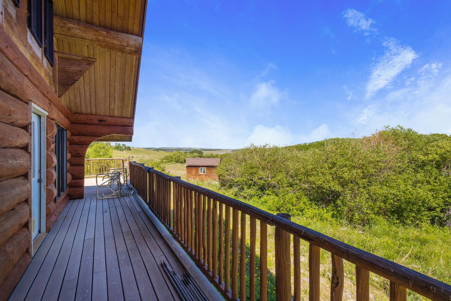 13984 Last Dollar Road Placerville, CO 81430 - Photo 23 of 43 a view of a balcony with wooden floor